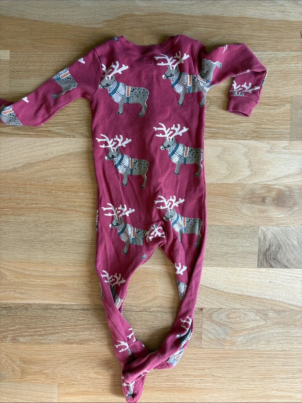 TEA COLLECTION | Berry Red Footed One-Piece with Reindeer Print